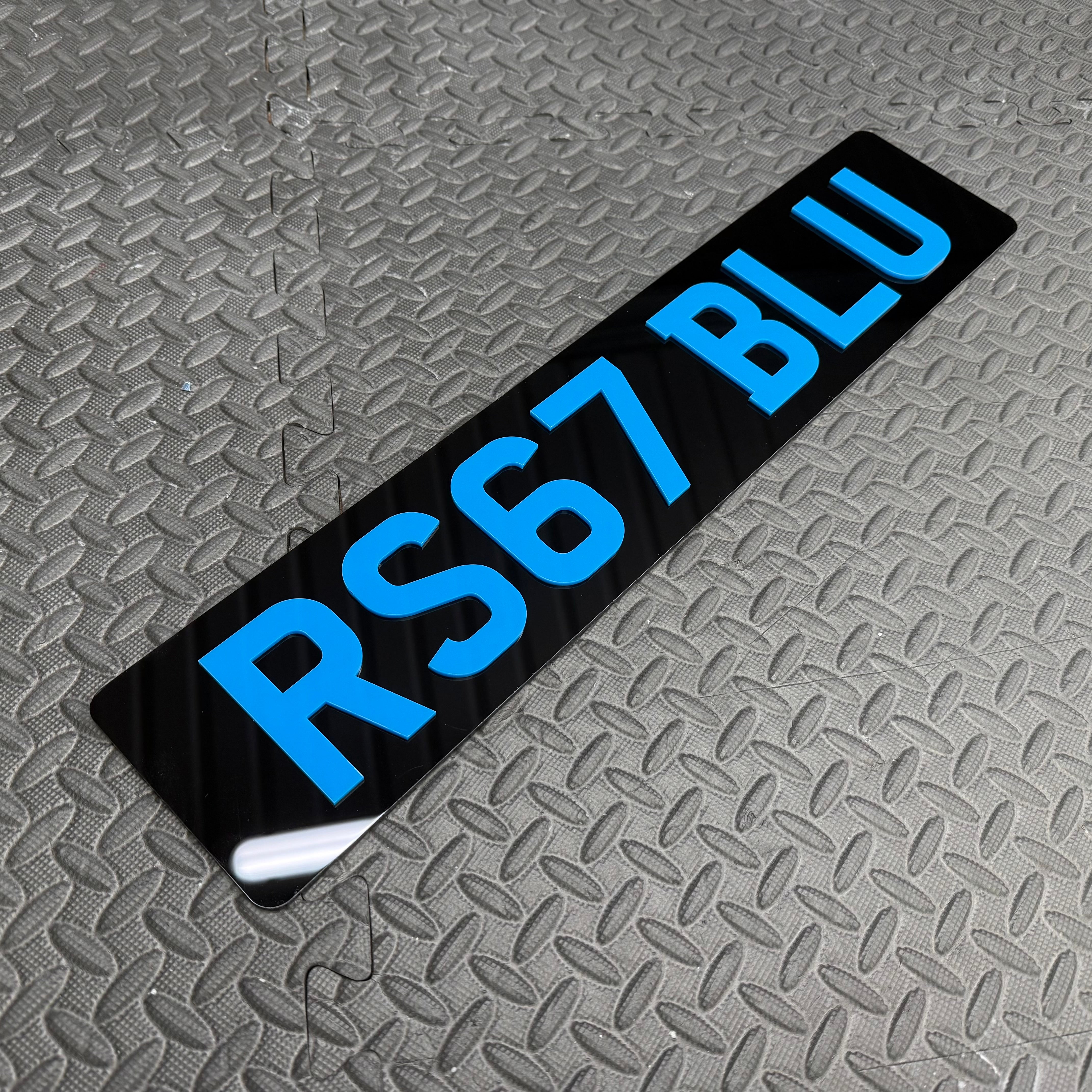Vehicle Show Plates - Custom Designs - Gloss Black Back Plate With UK Number Plate Style Lettering In Light Blue Custom Text